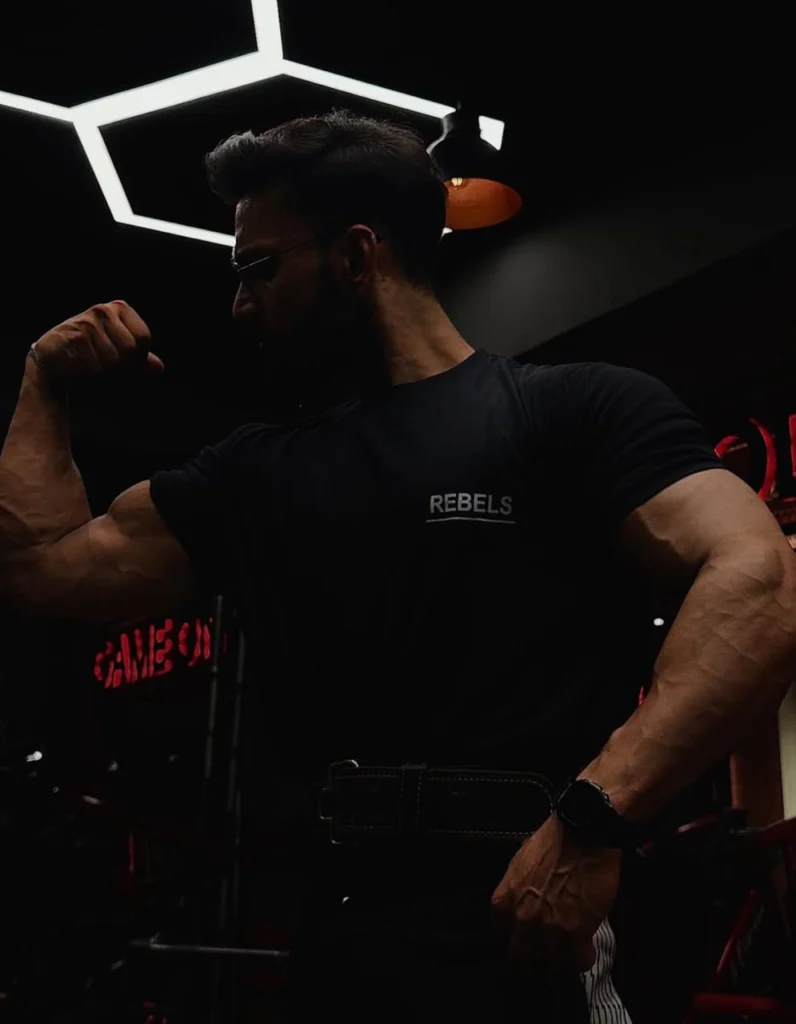 Black Slthrs tee in the gym